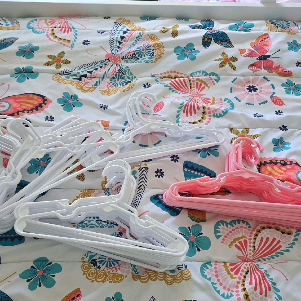 White and Pink Plastic Hangers